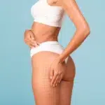Young Female With Perfect Body And Drawn Mesh On Hip