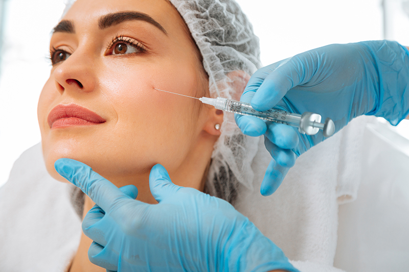 Close up of a female face during beauty procedure